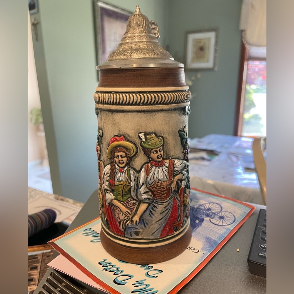 Made in W Germany. 3D Beer Stein. Hand crafted with silver lid never used.